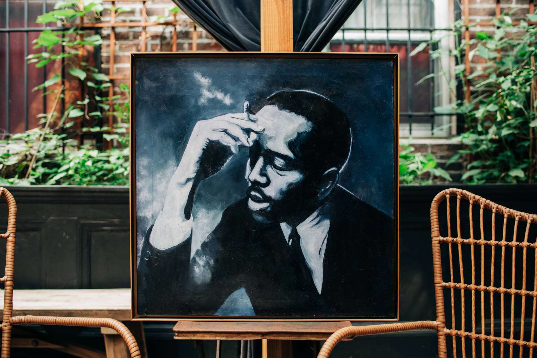 Oil portrait of Barry Harris in blue-grey